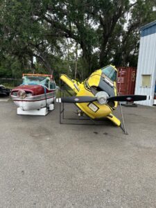 Cessna 188 and Cessna 210 aircraft being containerized by Neel Aviation for shipment to Paraguay