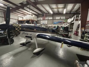 DR-109 aircraft being disassembled and containerized by Neel Aviation for shipment to Uruguay
