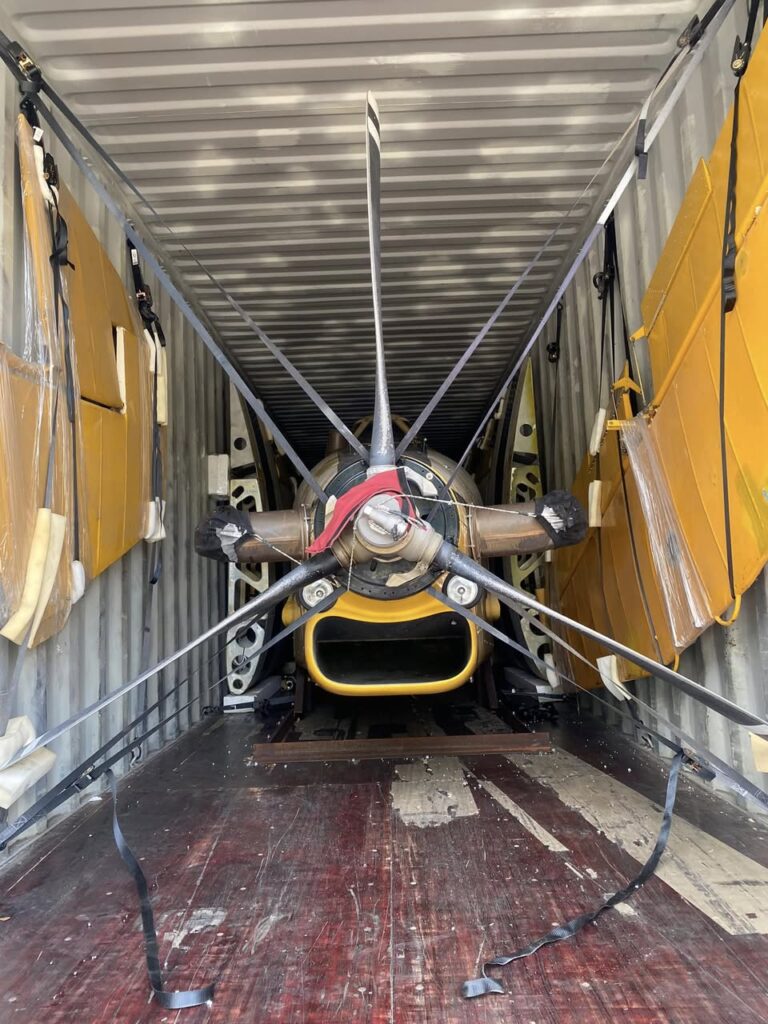 Aircraft disassembly services preparing airplane for international shipping by Neel Aviation