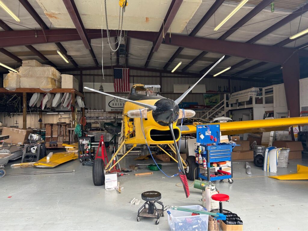 Aircraft disassembly services preparing airplane for international shipping by Neel Aviation